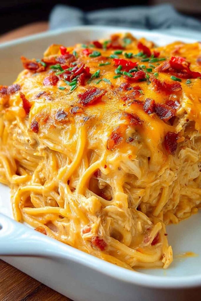 Garlic Butter Chicken Bites and Potatoes in a cast iron skillet with golden seared chicken bites, crispy baby potatoes, and fresh parsley