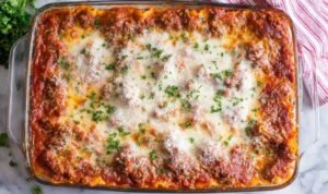 Classic Homemade Lasagna Recipe Classic lasagna recipe baked in a 9x13 dish with golden melted mozzarella and bubbling meat sauce
