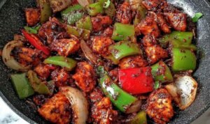 Easy Black Pepper Chicken Easy black pepper chicken recipe served over steamed jasmine rice in a white bowl