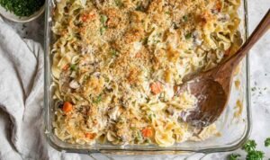 Easy Tuna Casserole Easy homemade tuna casserole in a 9x13 baking dish with golden panko Parmesan topping and fresh parsley