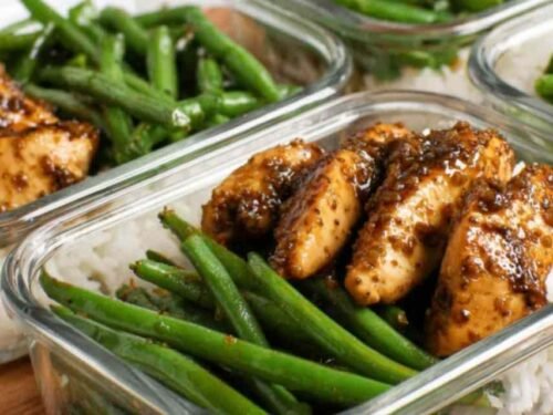 One pan chicken breast and green beans coated in honey soy sauce served over white rice