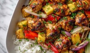 Hawaiian Chicken Sheet Pan with juicy chicken breast, caramelized pineapple chunks, and colorful bell peppers on a parchment-lined baking sheet